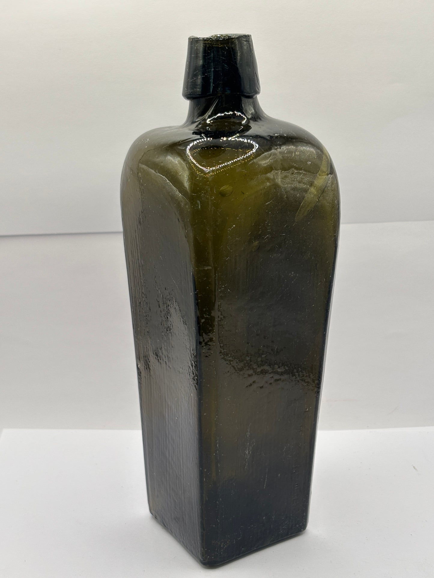 Old green glass gin bottle, case gin