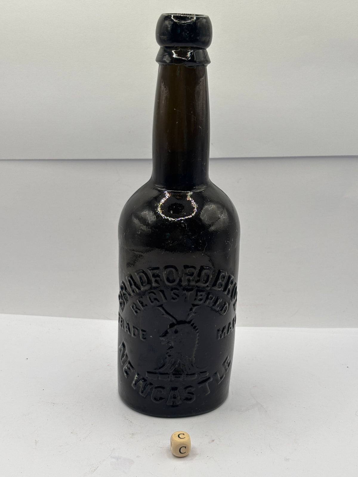 Old advertising beer bottle, Bradford Bros Newcastle (c)