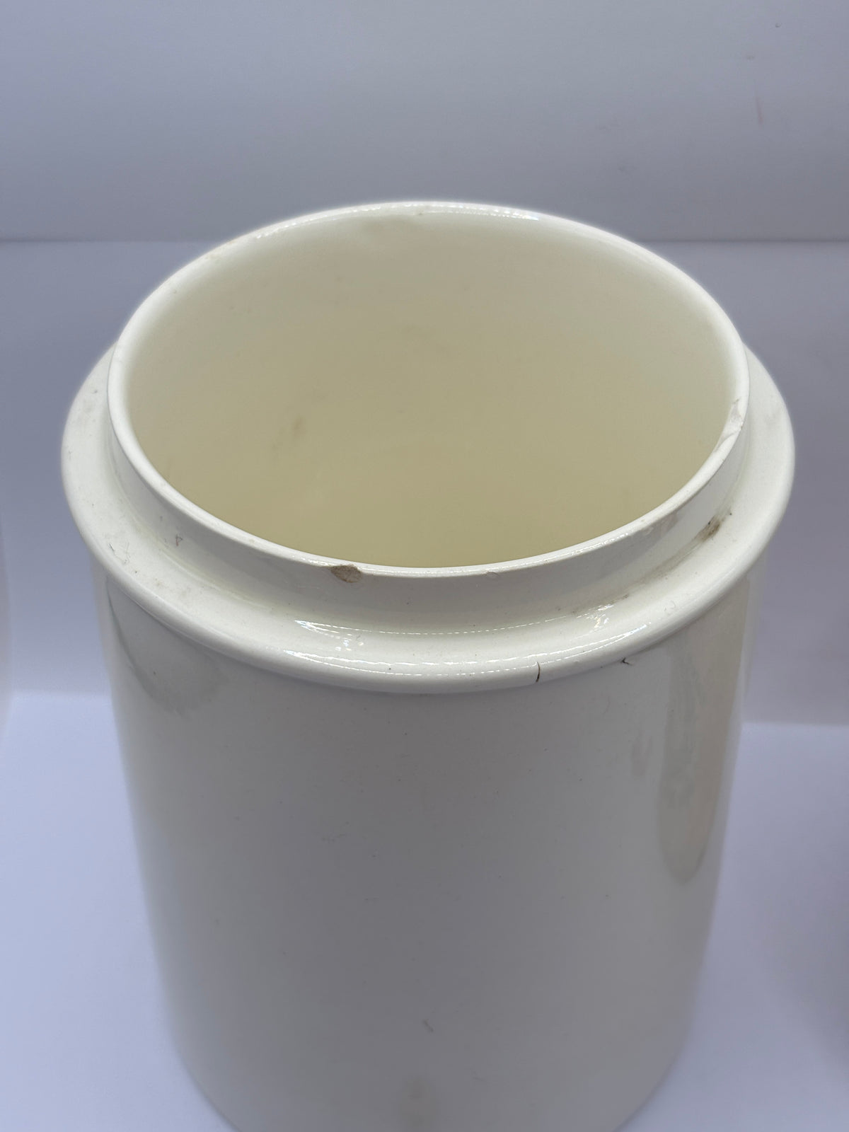 Old large plain white stoneware apothecary jar (B)