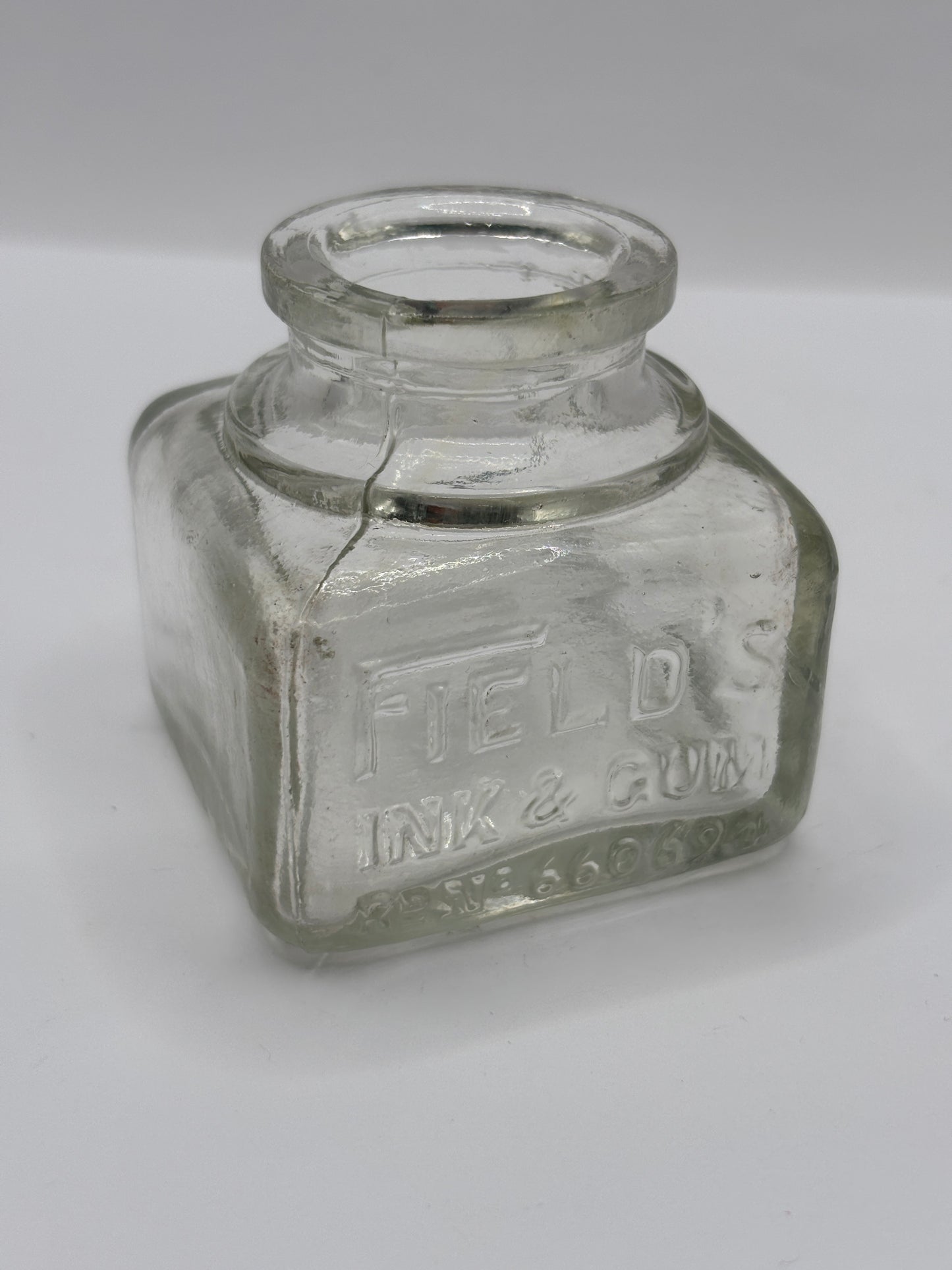 Old clear glass advertising inkwell, ink bottle. Fields ink