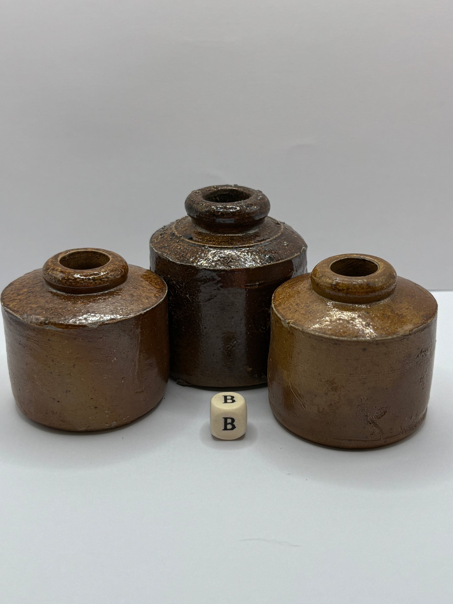 3 brown stoneware inkwells, pork pie inks (B)