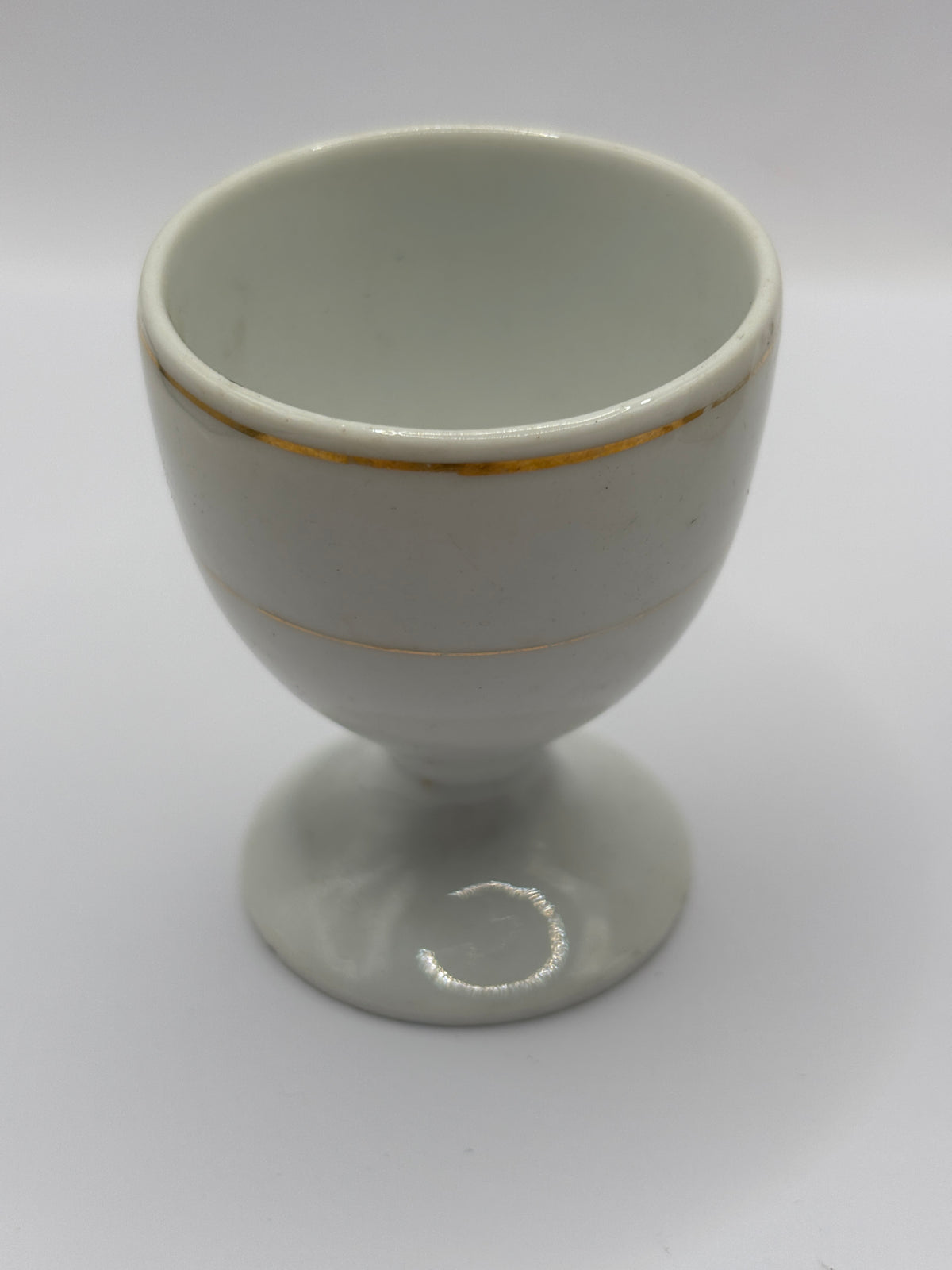 Old ceramic egg cup, dump dug