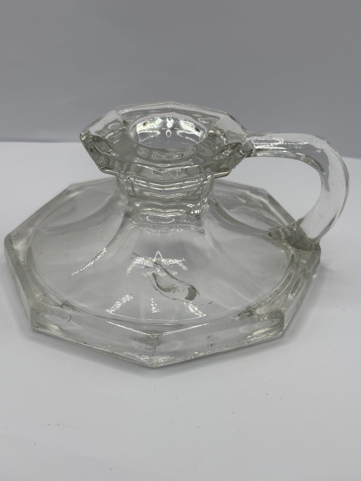 Old glass candlestick holder
