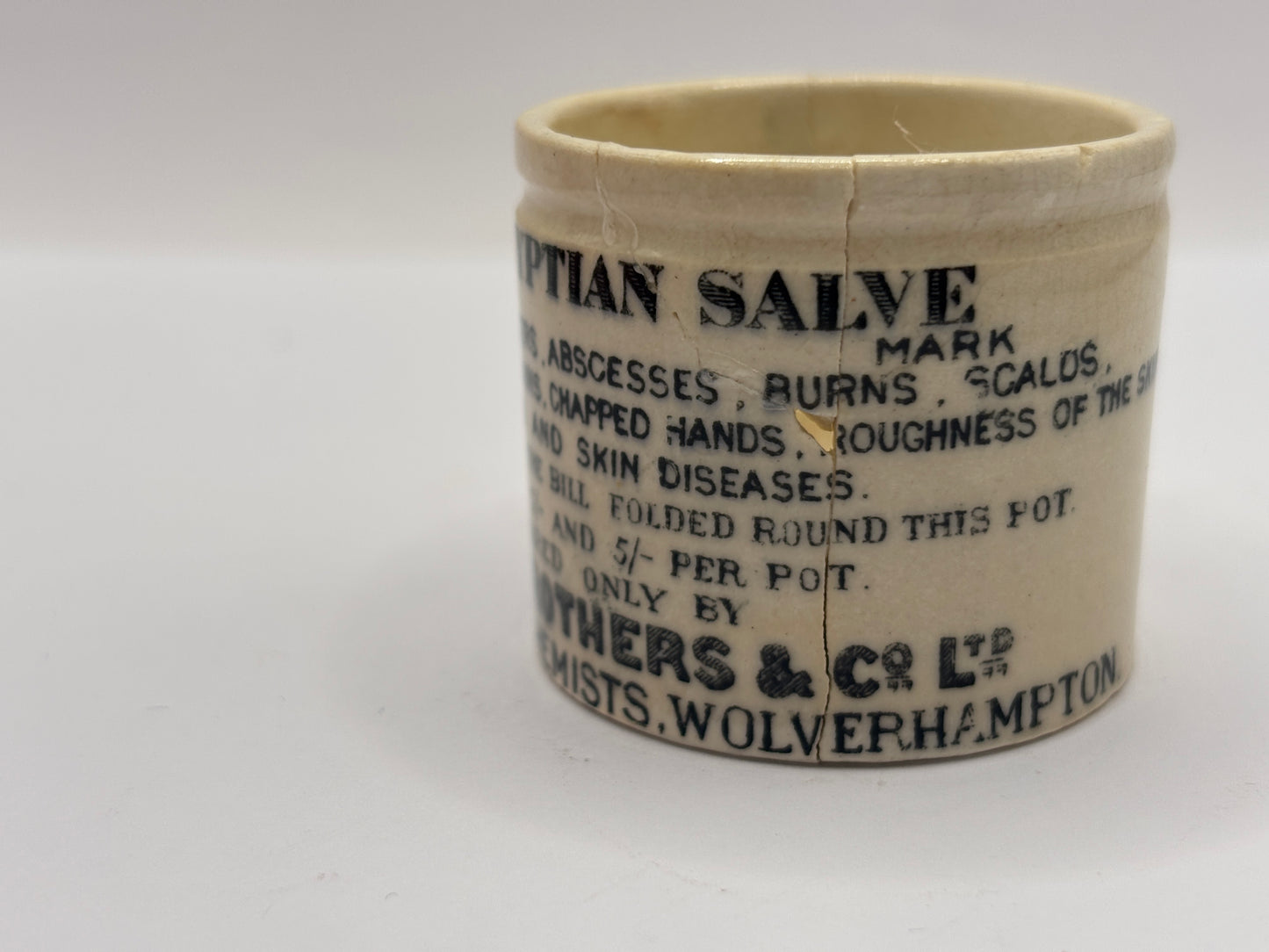 Old advertising ointment pot, The Egyptian salve. Damaged