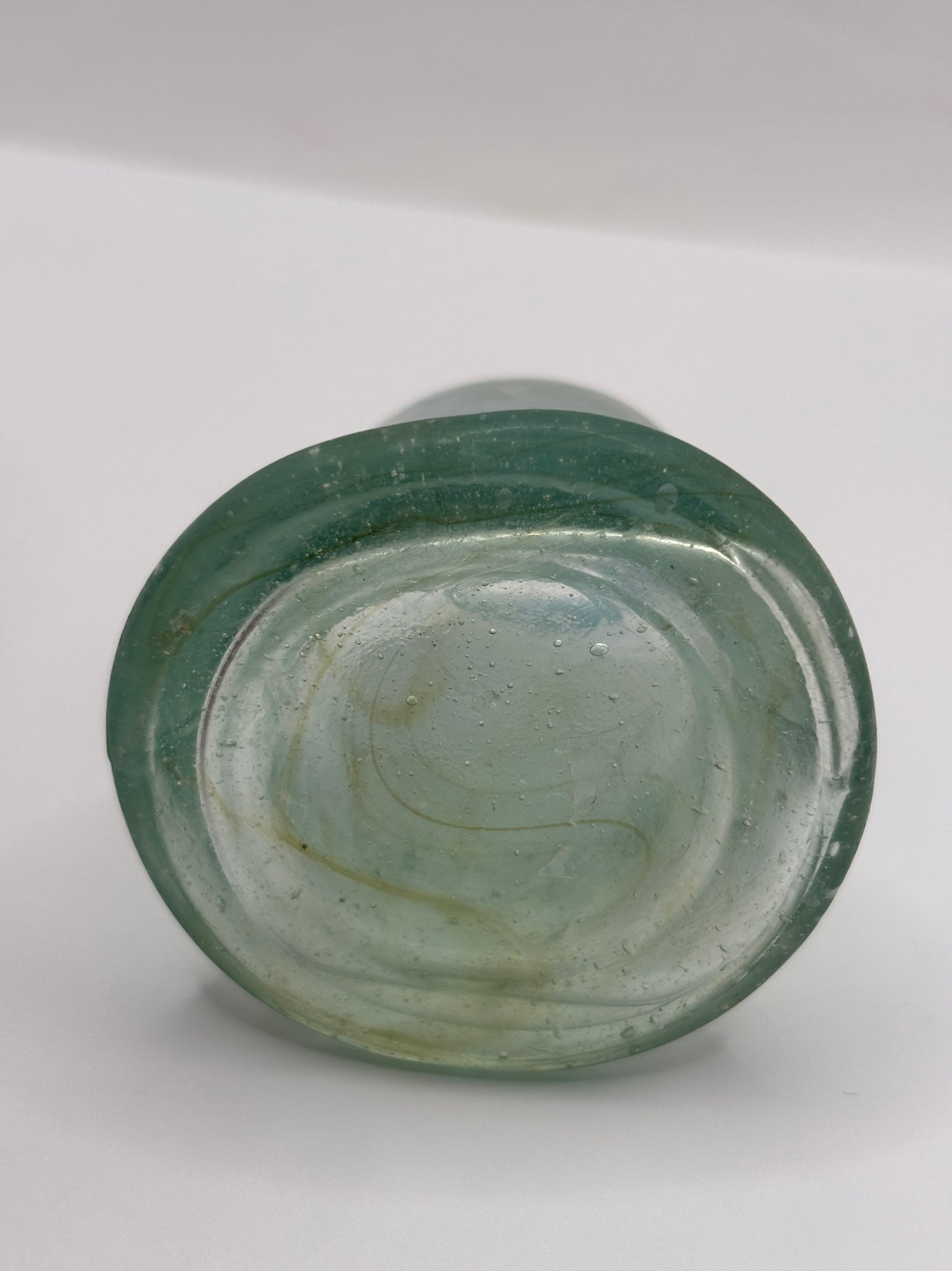 Old aqua glass inkwell, Bell ink. Swirly 7cms
