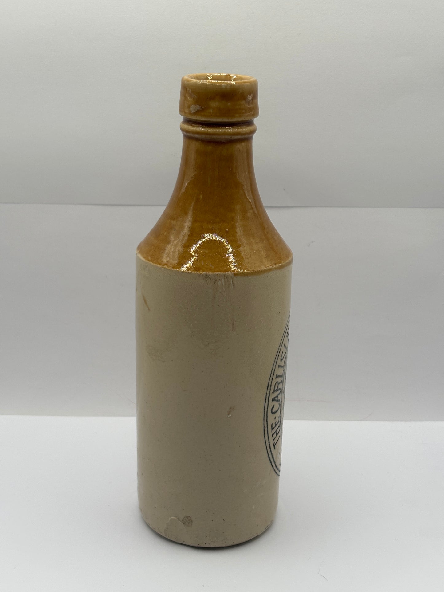 Old stoneware stout bottle, The Carlisle new brewery