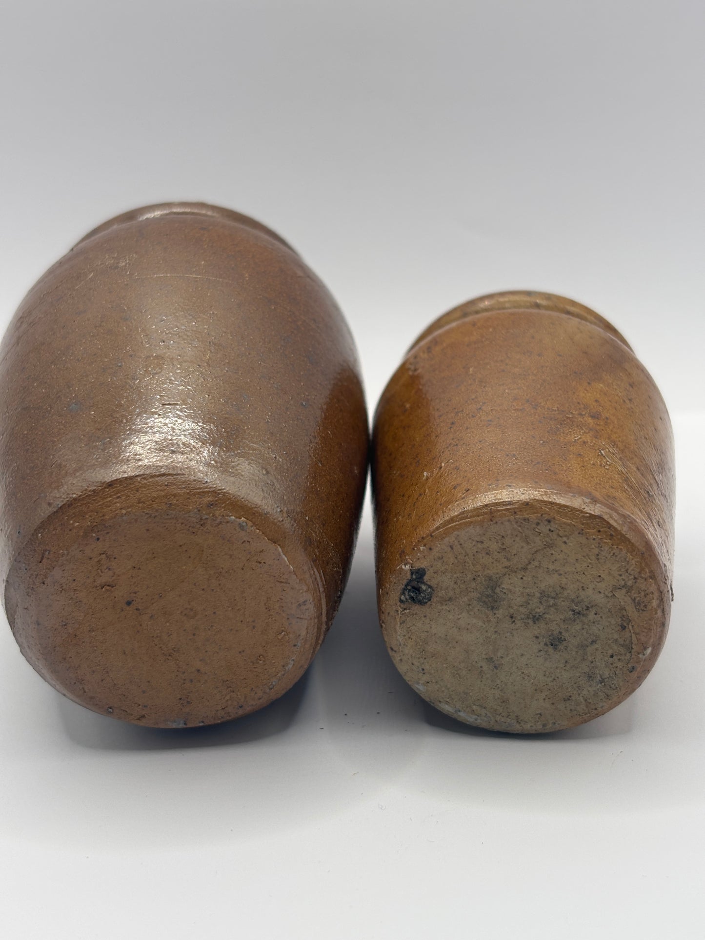 2 Old brown stoneware cream pots