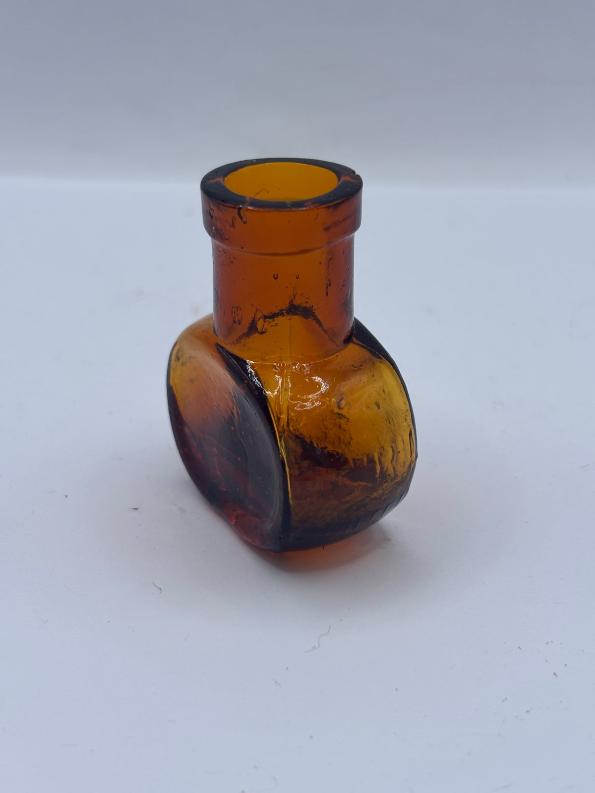 Old mini 1oz amber glass advertising Bovril bottle