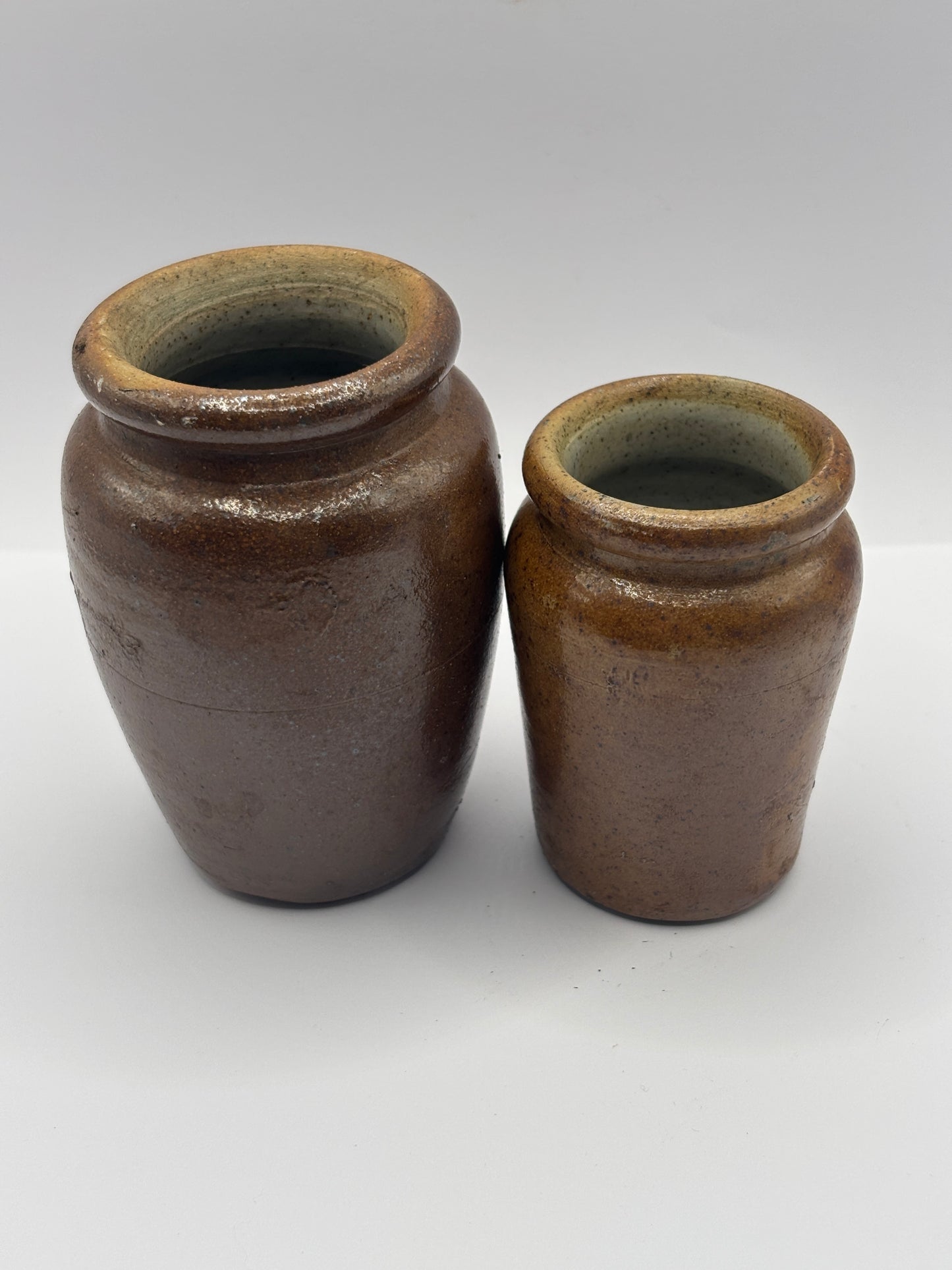 2 Old brown stoneware cream pots