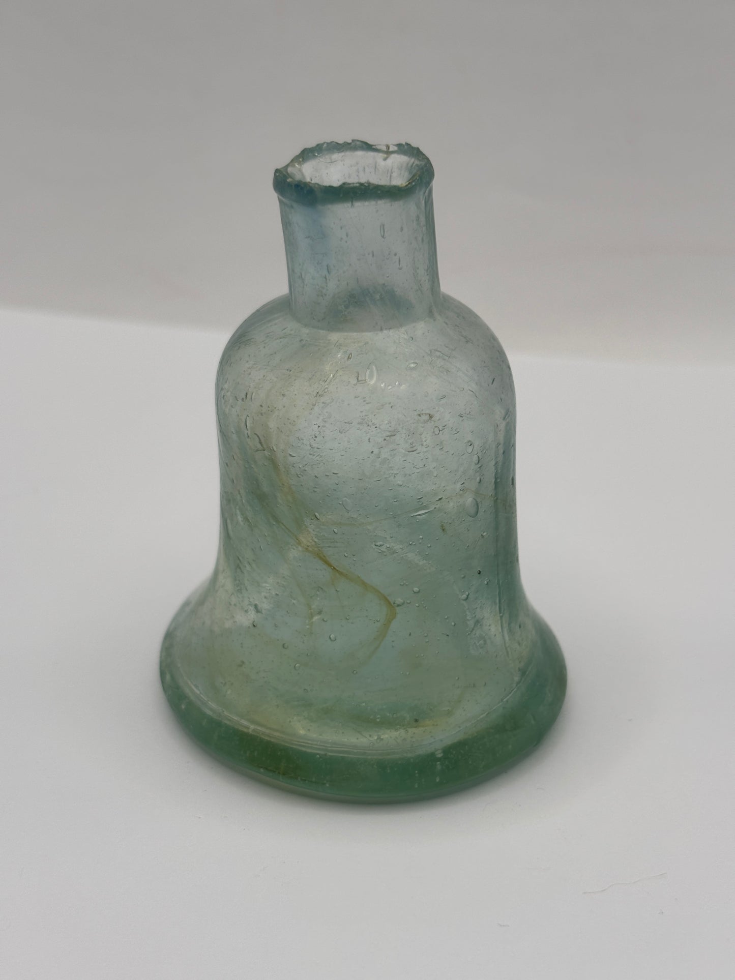 Old aqua glass inkwell, Bell ink. Swirly 7cms