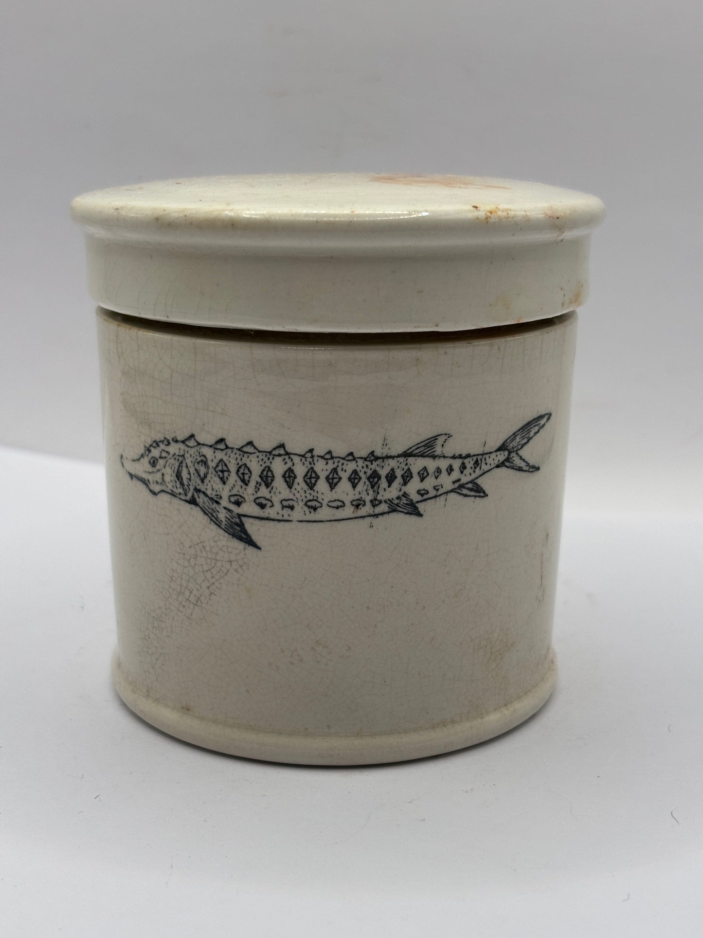 Old stoneware caviar jar and lid. Chipped