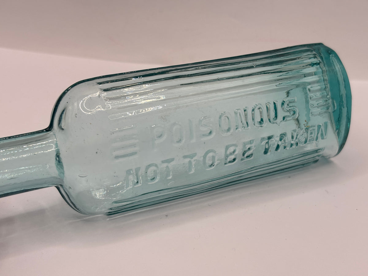 Old aqua glass poison bottle, POISONOUS Not to be taken