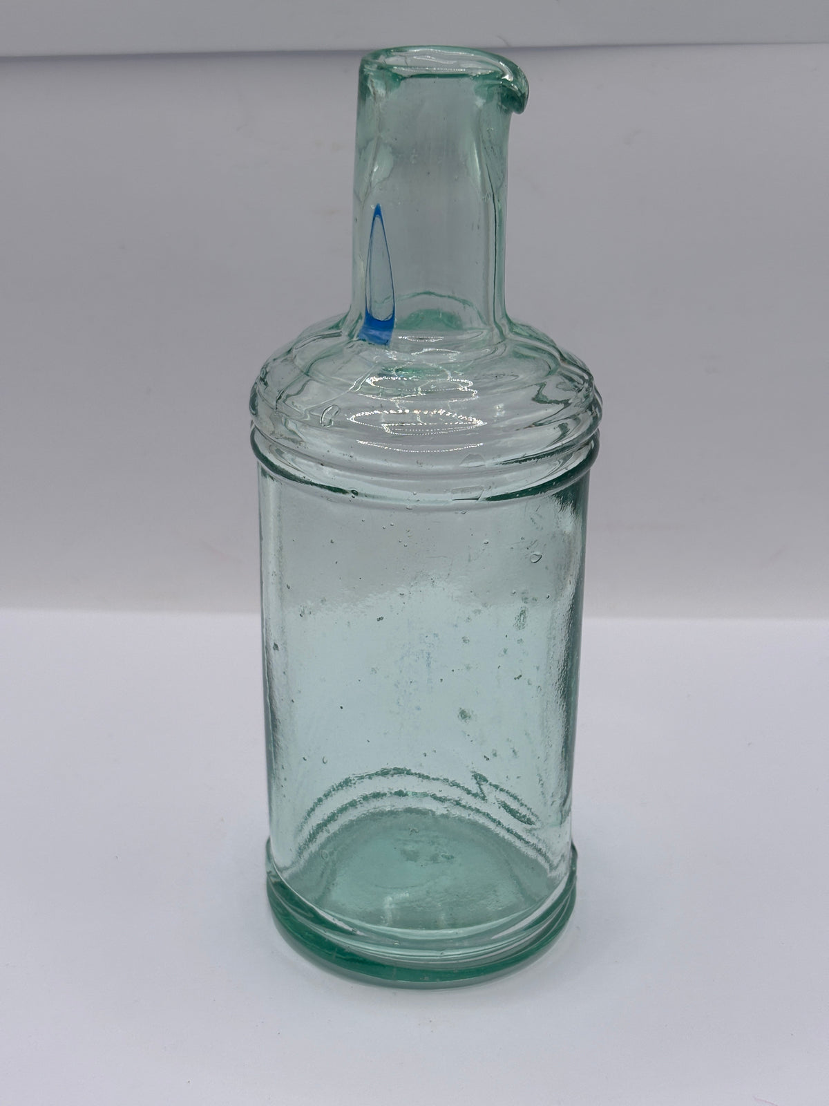 Old tall aqua glass inkwell, ink bottle, pouring ink 14.5cms