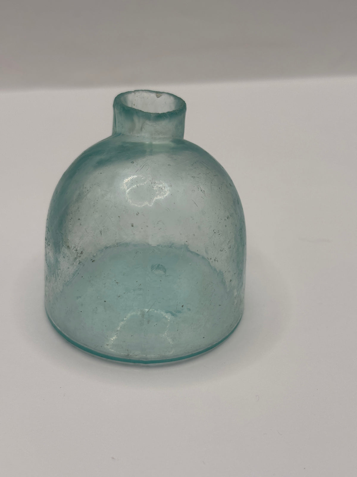 Old aqua glass igloo ink, swirly glass