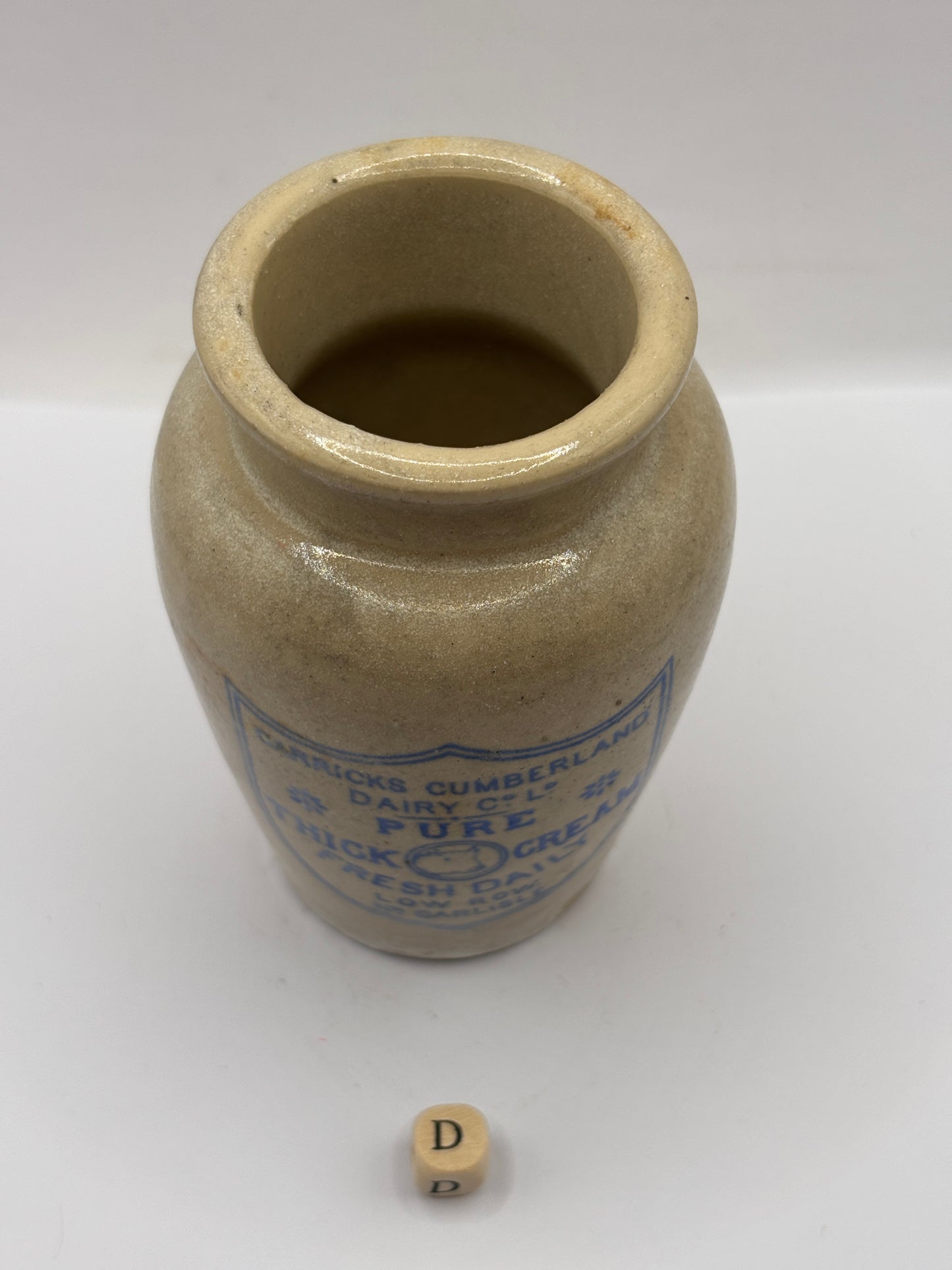 Old advertising cream pot, Carricks Cumberland dairy. Pure thick cream (D)