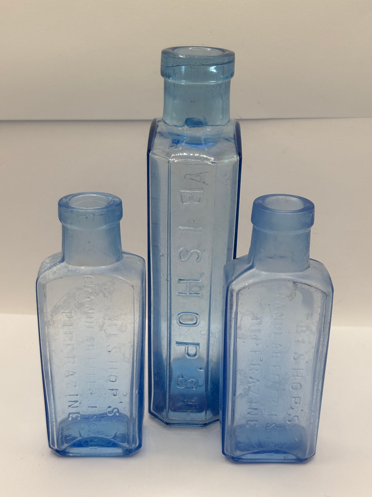 3 old blue bishops chemist bottles