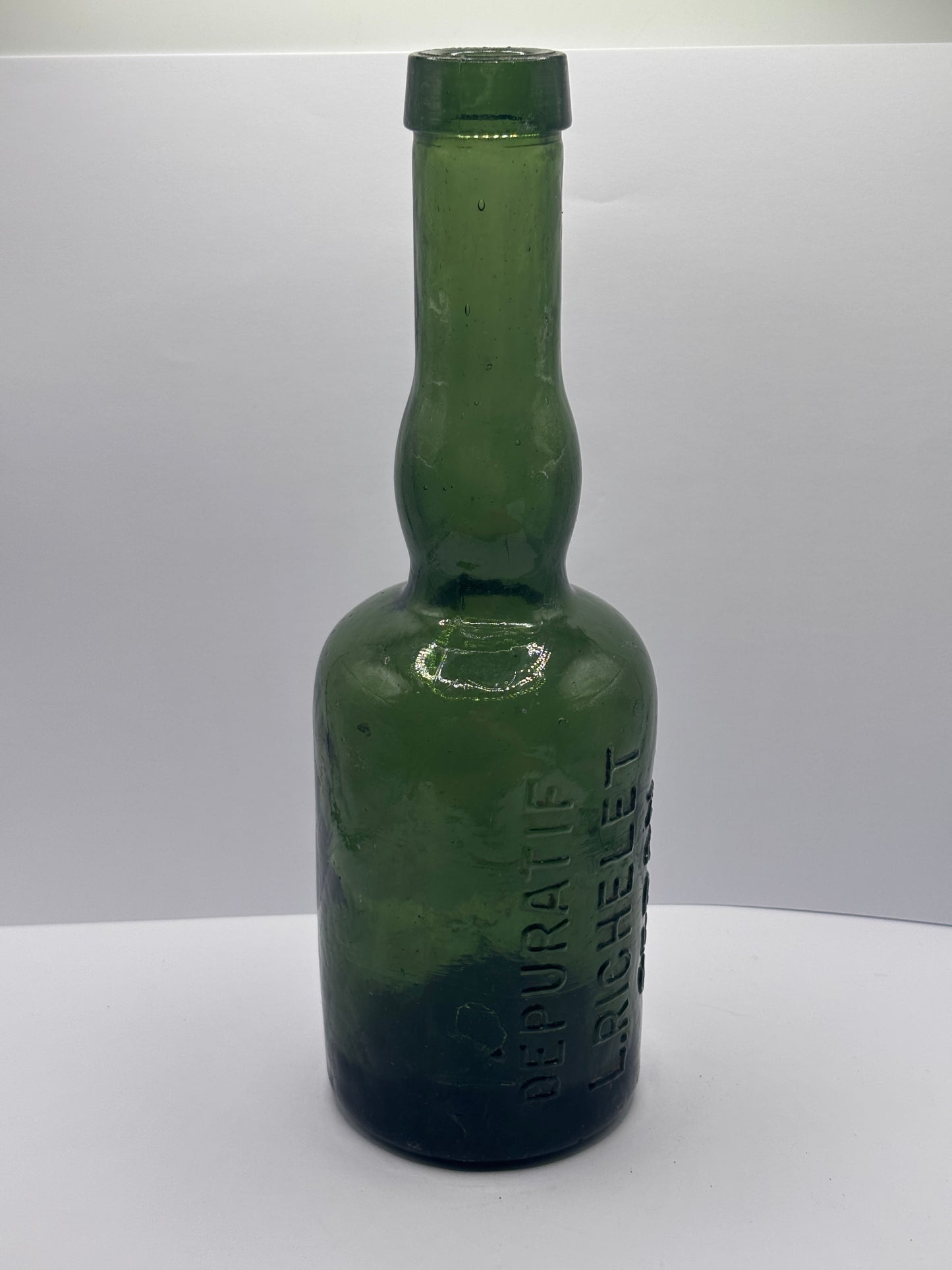 Old green glass beer bottle, Sedan