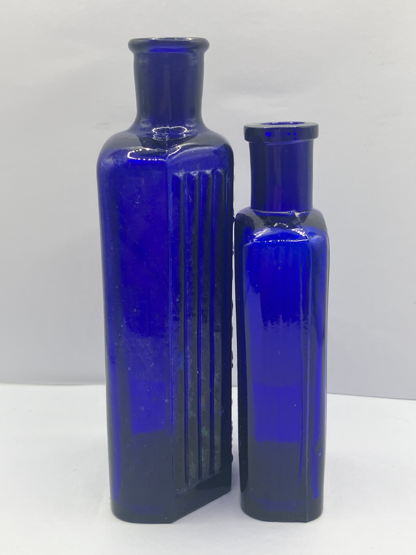 2 blue ribbed poison bottles, Not to be taken