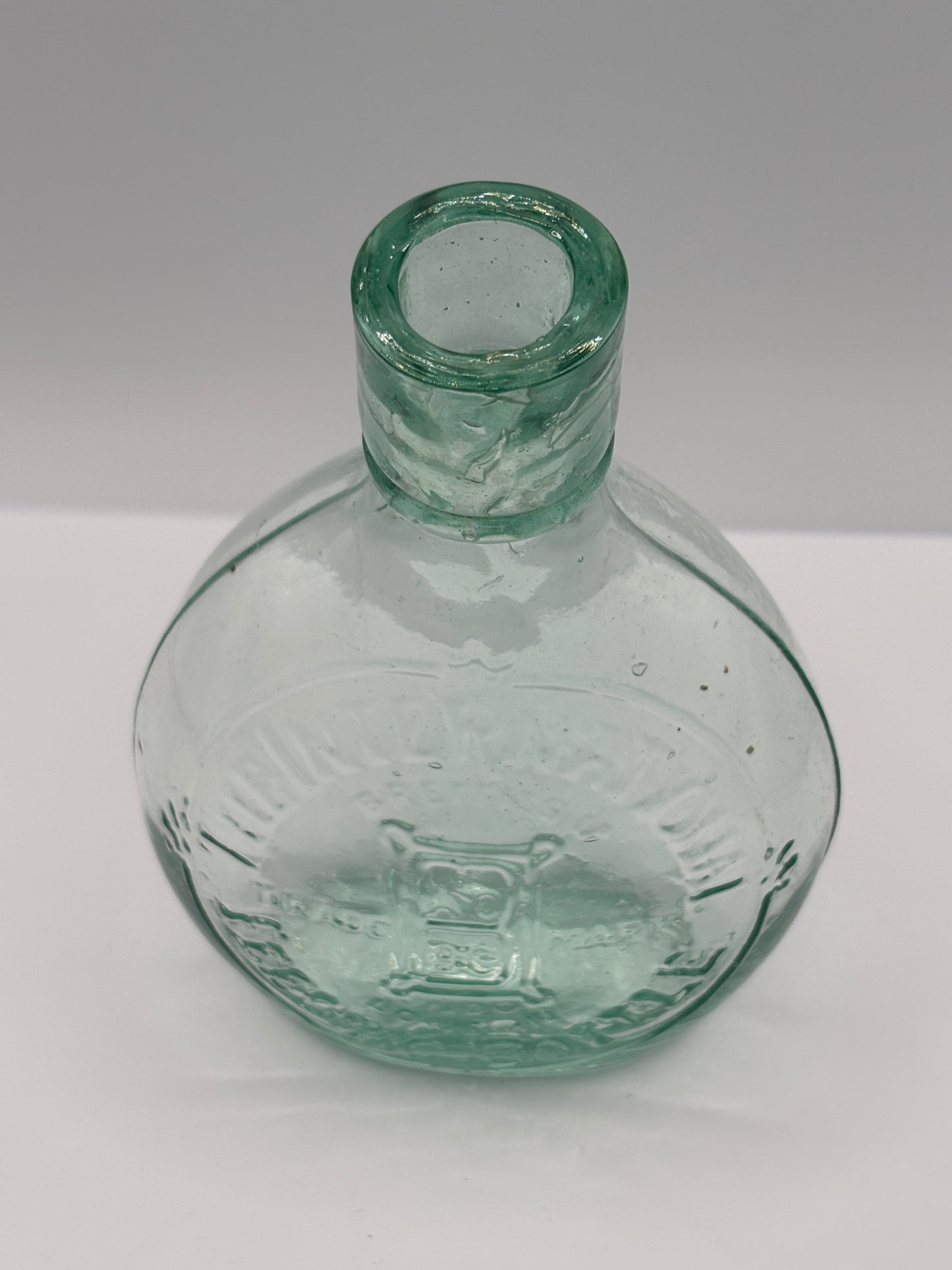 Old aqua glass baby feeder. The international feeder