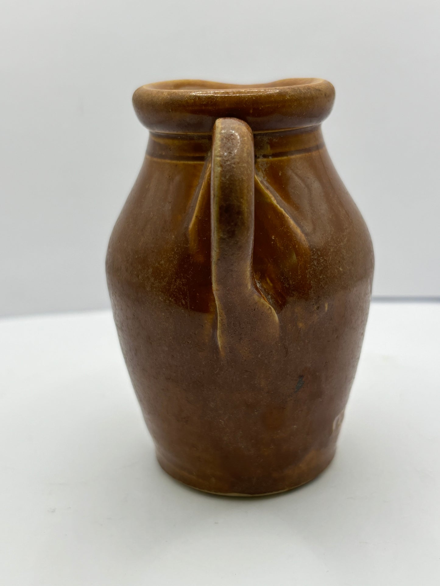 Old stoneware shop display cream pot. Turners cream Disley.