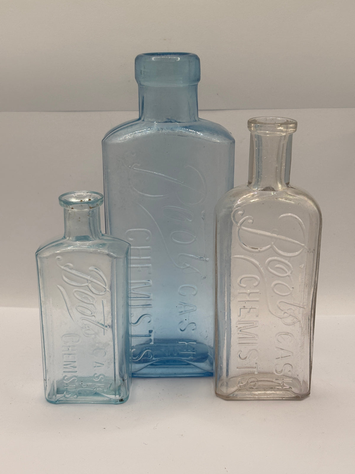3 crusty old Boots cash chemist bottles