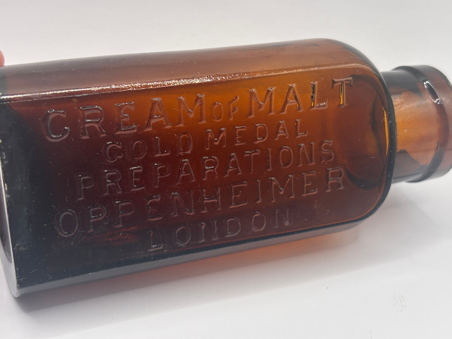 Old amber glass cream of malt bottle