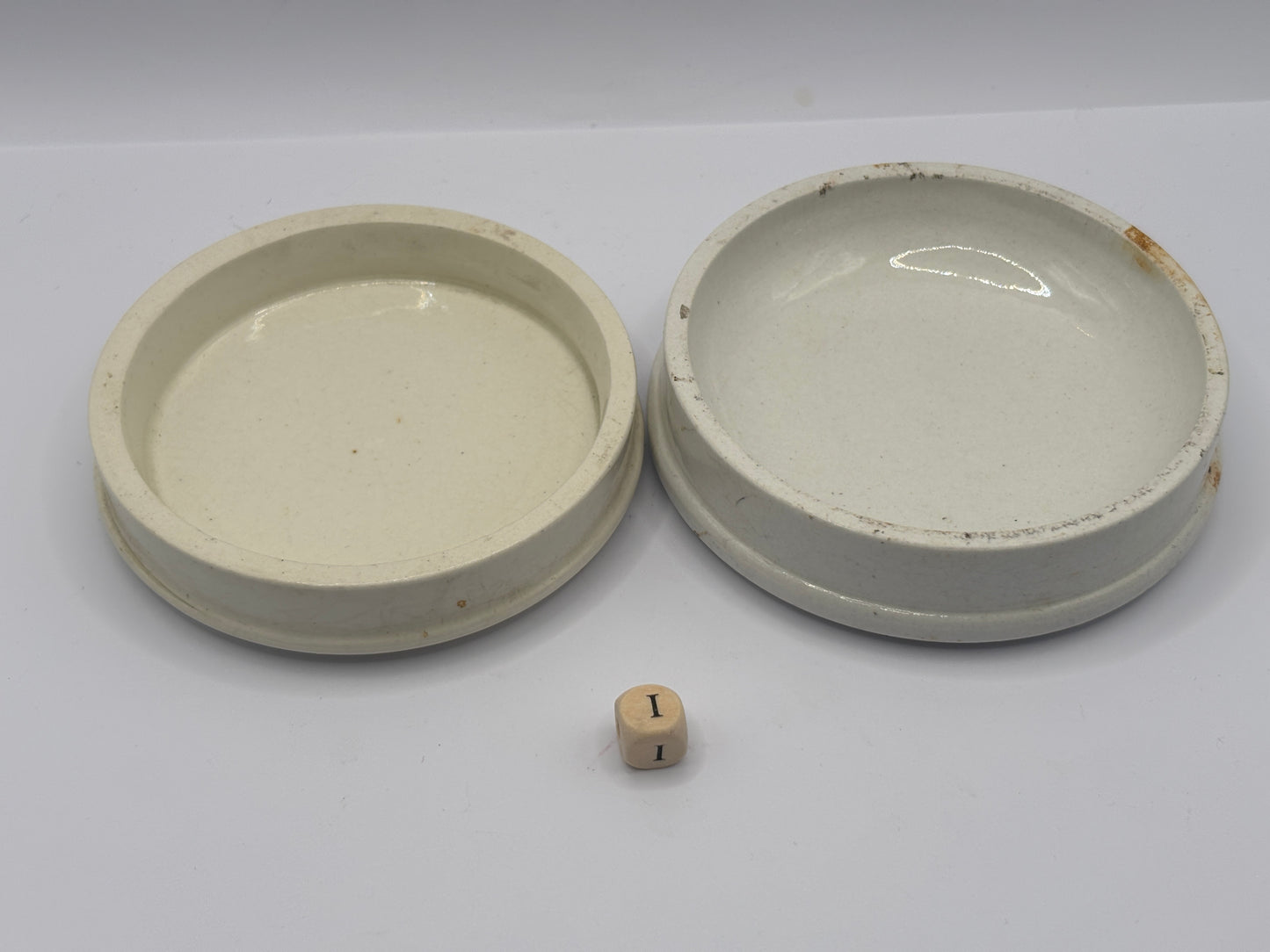 2 old plain stoneware lids (i)
