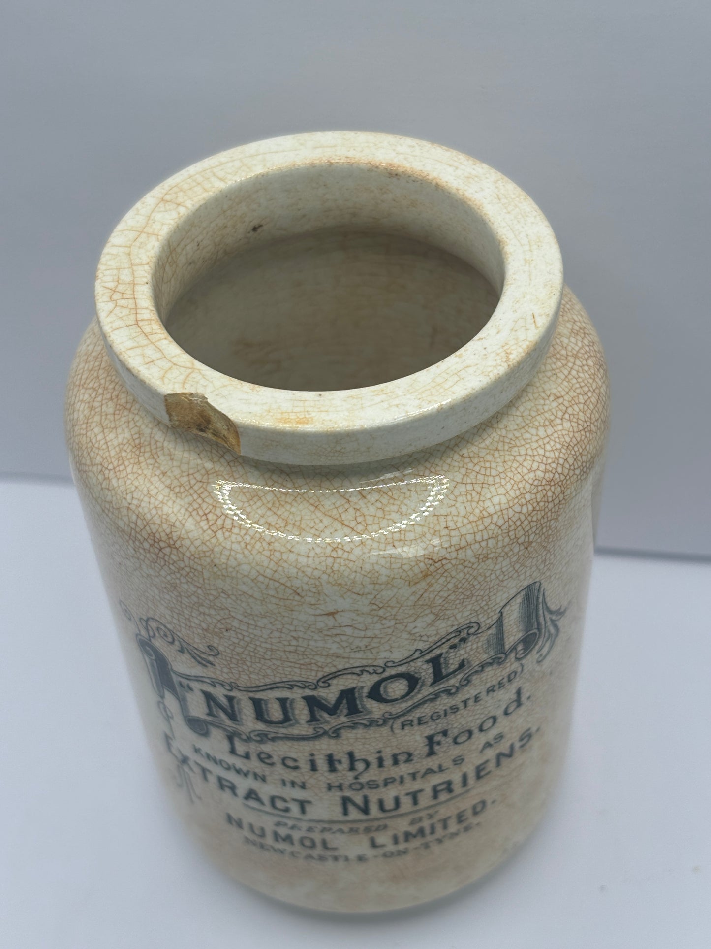 Early numol advertising jar