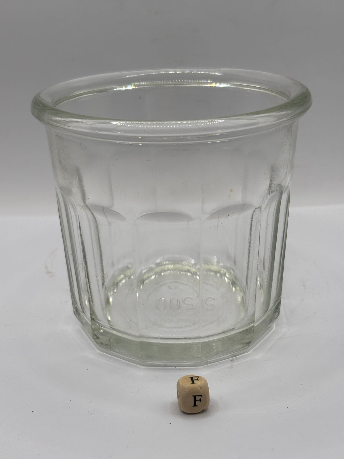 Old clear glass French jam jar (F)