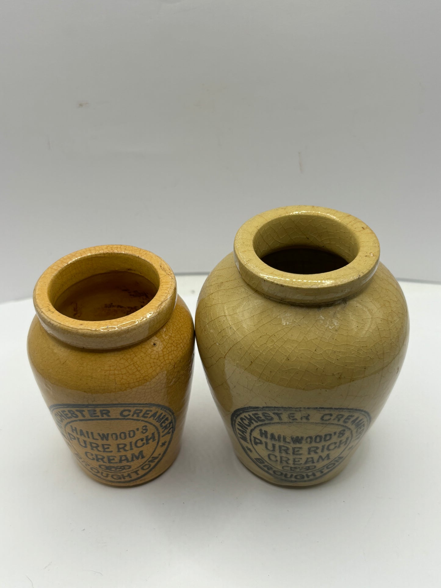 2 advertising cream pots, Stained & crazed