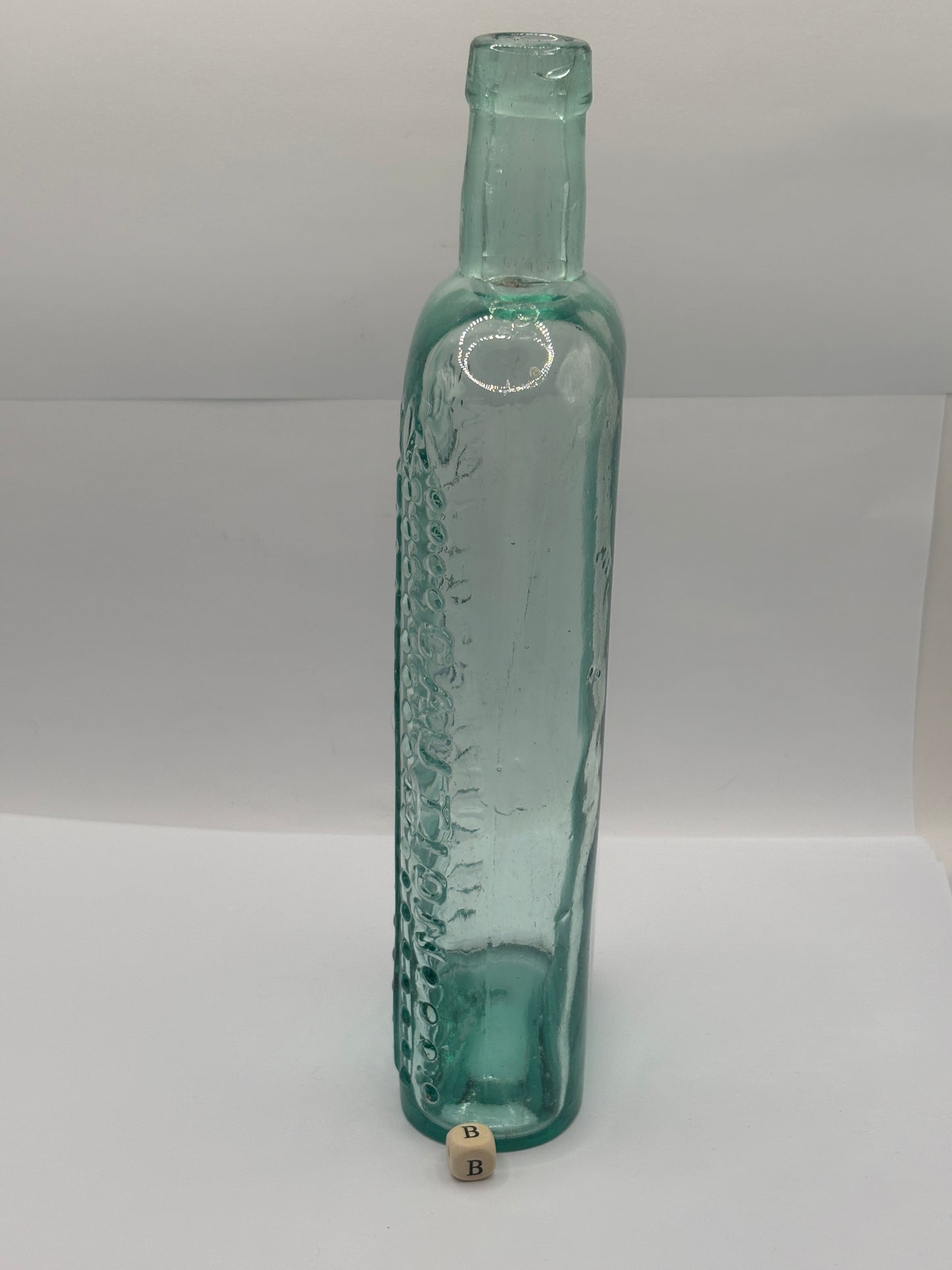 Old large aqua glass poison bottle, Poisonous (B) ammonia