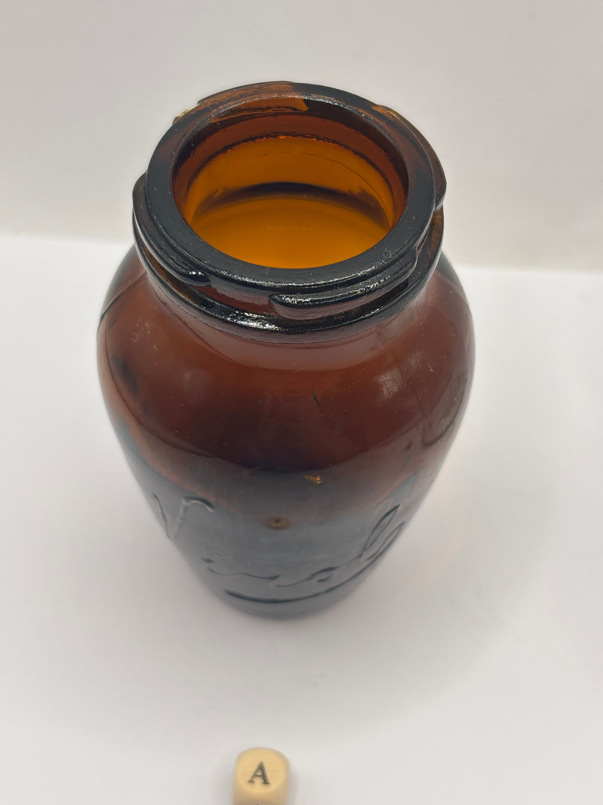 Old amber glass Virol jar (a) 10.5cms