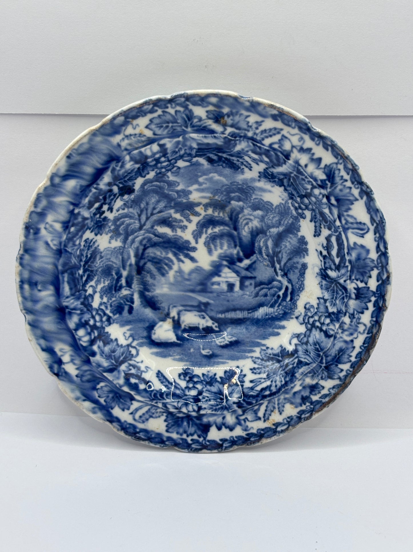 4 old blue and white transferred stoneware plates