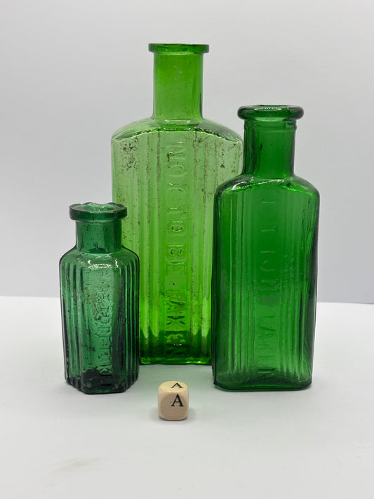3 old green poison bottles, not to be taken