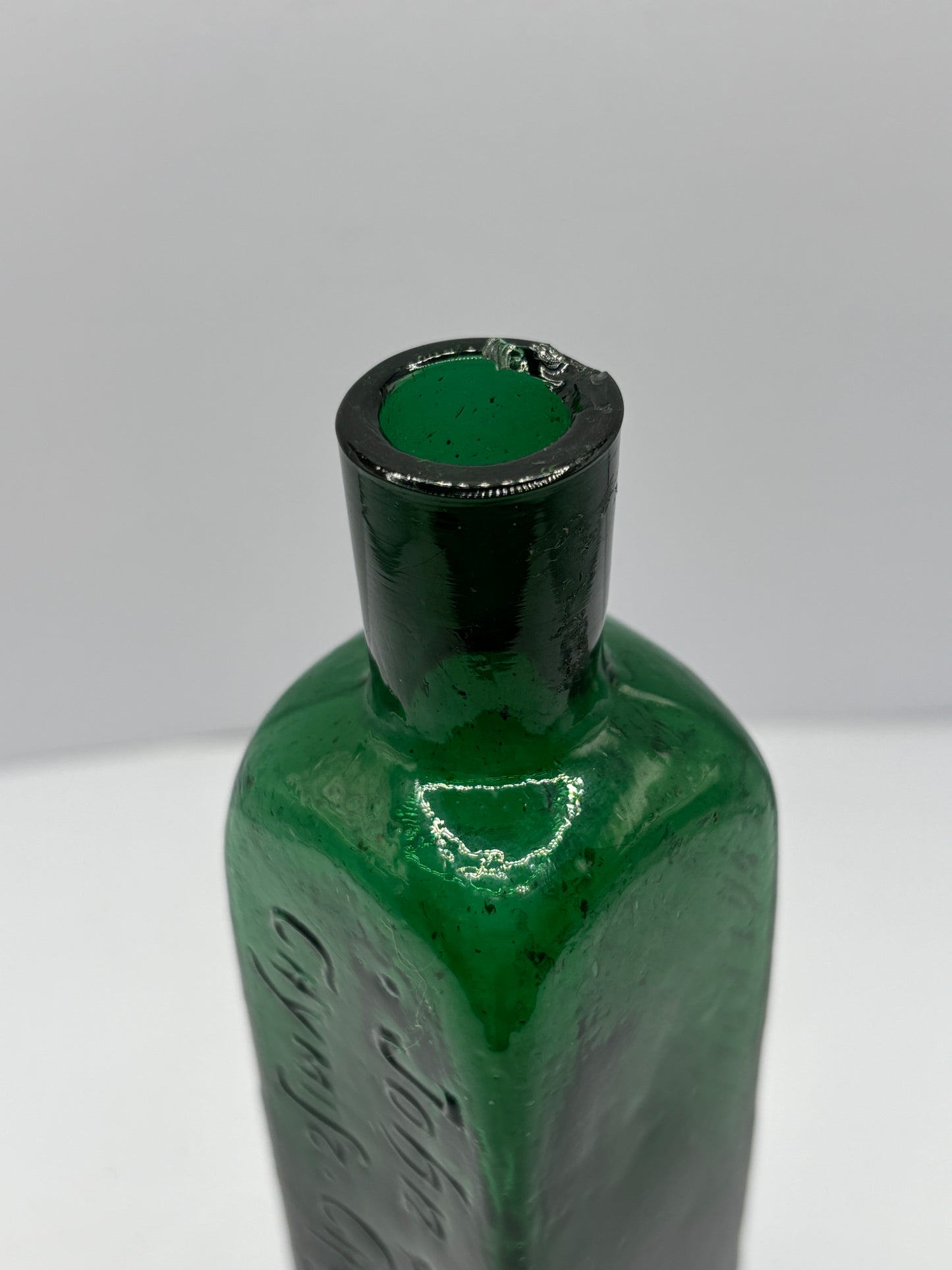 Old green advertising lavender water bottle, Ye far famed olde english lavender water