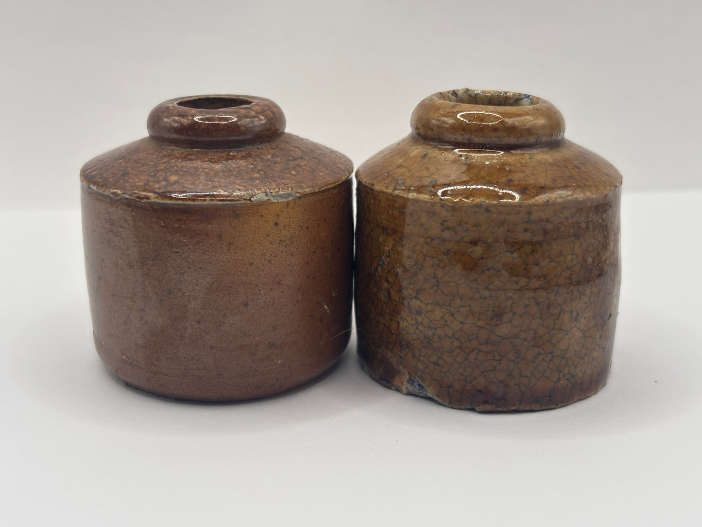 2 brown stoneware inkwells, ink bottles. Pork pie inks