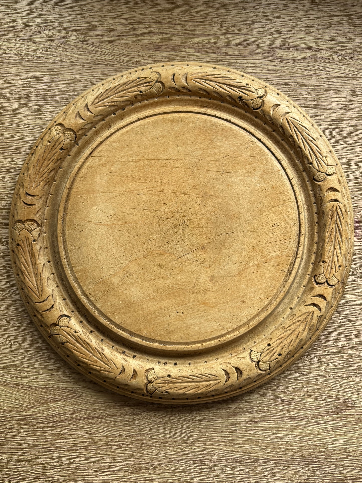 Old carved bread board