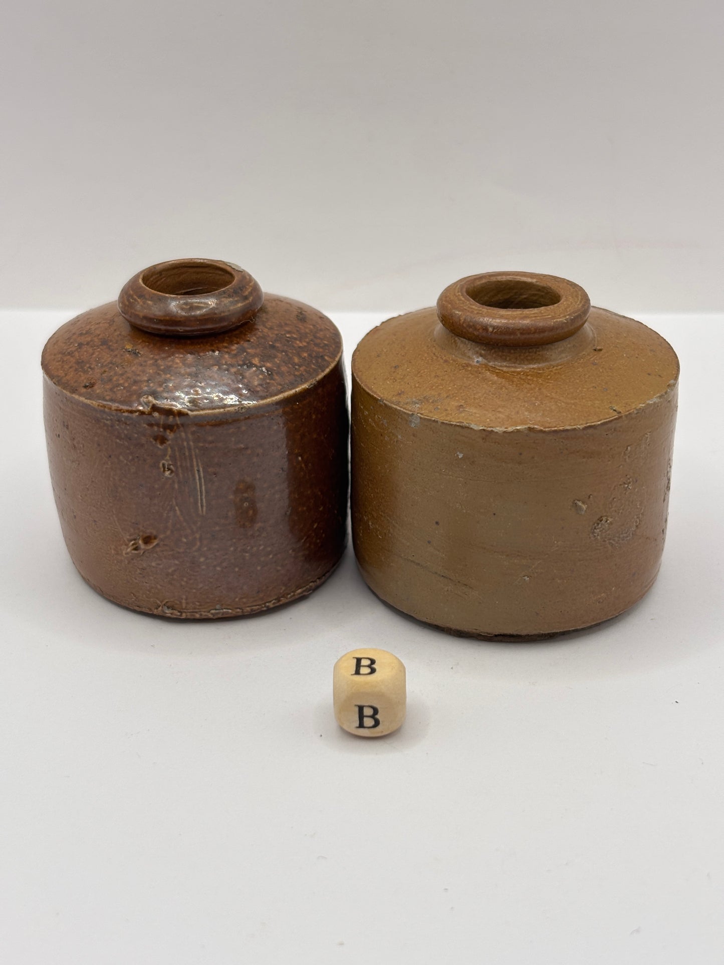 2 brown stoneware inkwells, ink bottles (B) pork pie inks