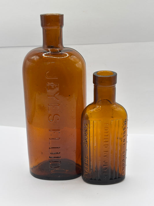 2 Old amber glass Jeyes fluid bottles