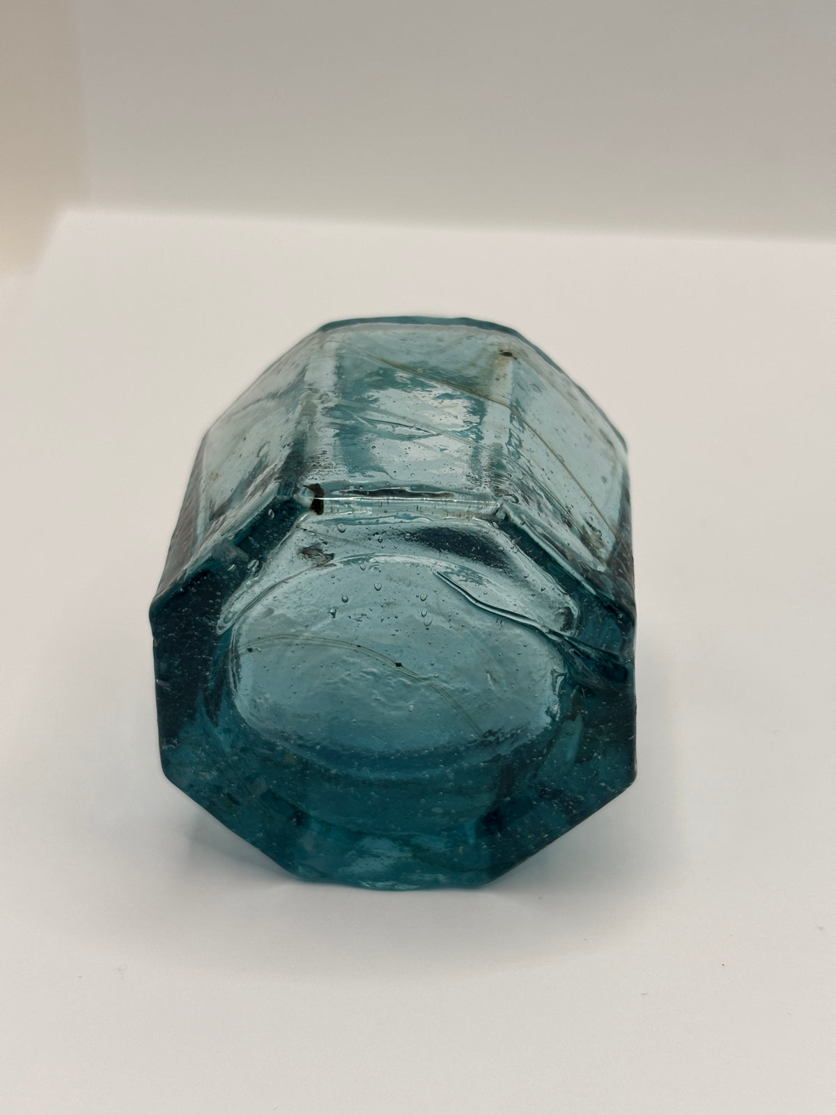 Old blue glass inkwell, ink bottle, penny ink with swirls