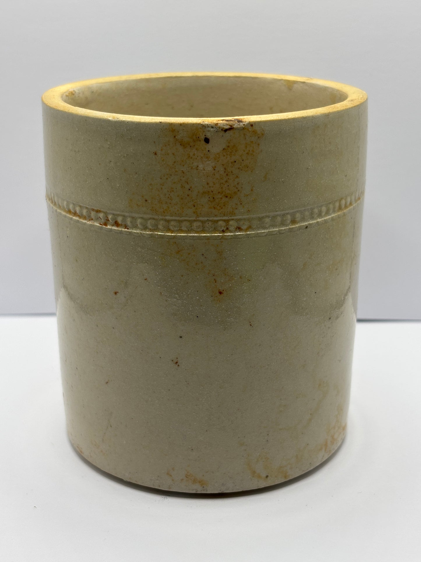 Old white stoneware jar