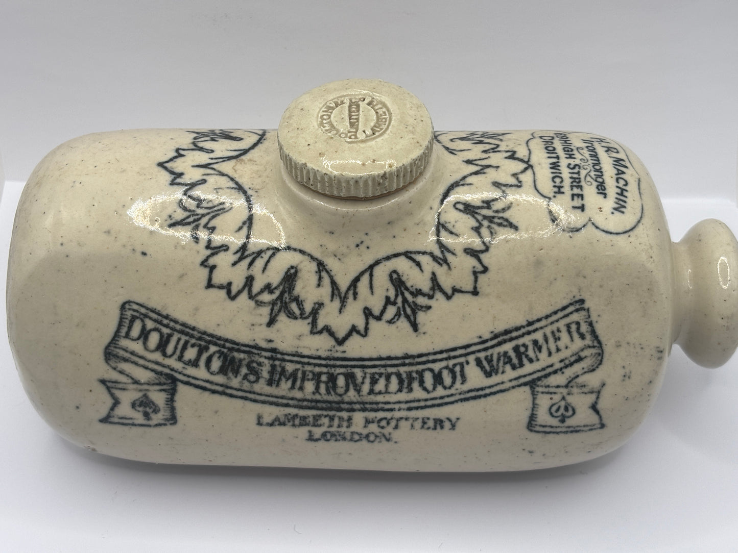 Old Doultons advertising footwarmer. Doultons improved foot warmer