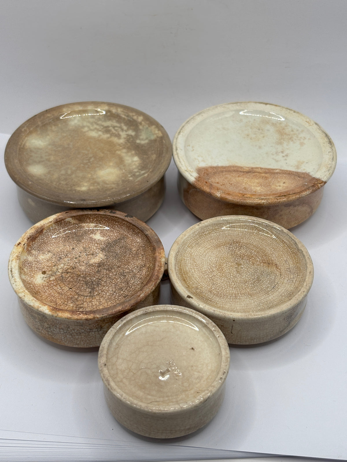 5 old stoneware pot lid bases, stackers (m)