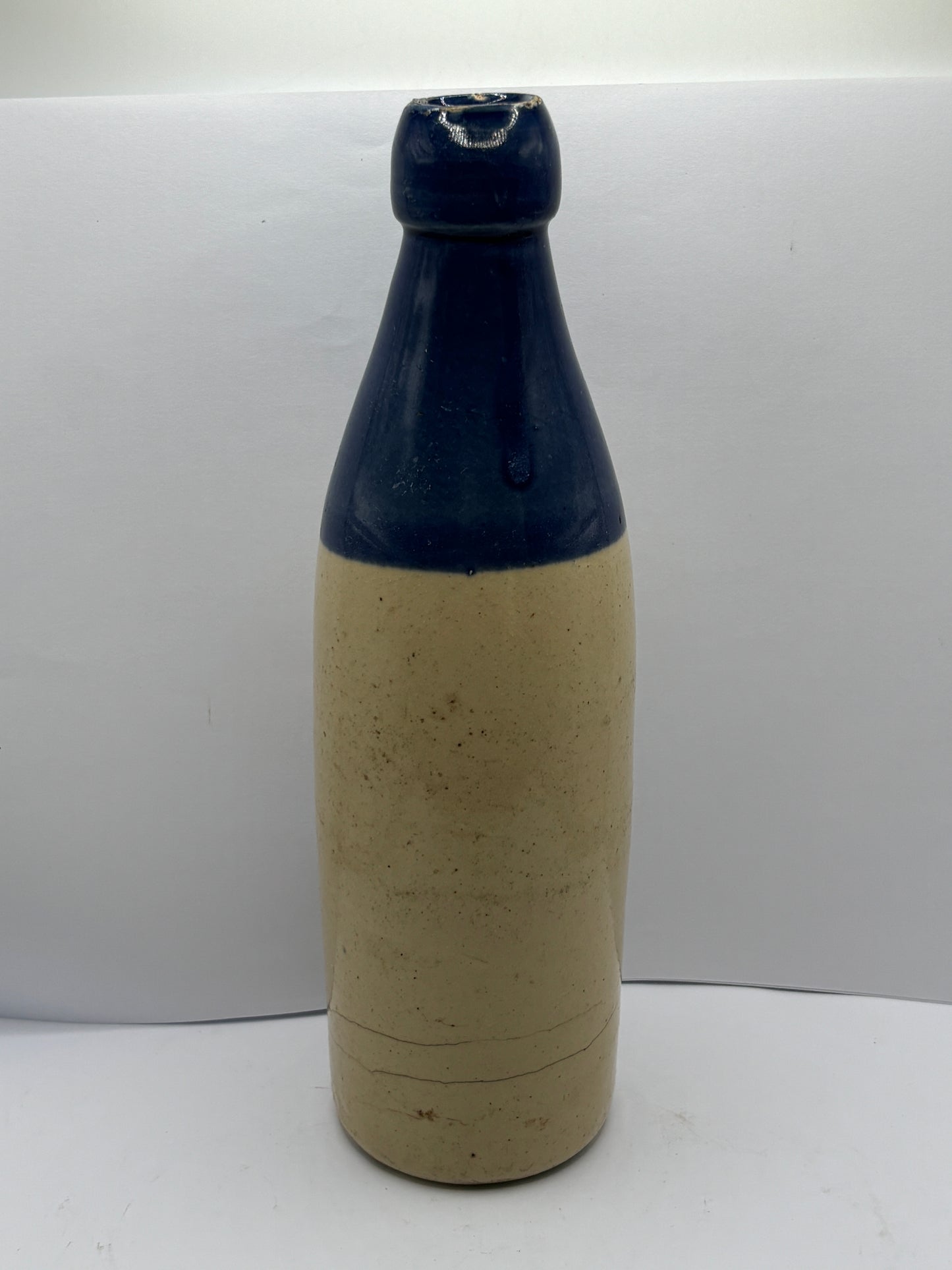 Old blue top ginger beer bottle