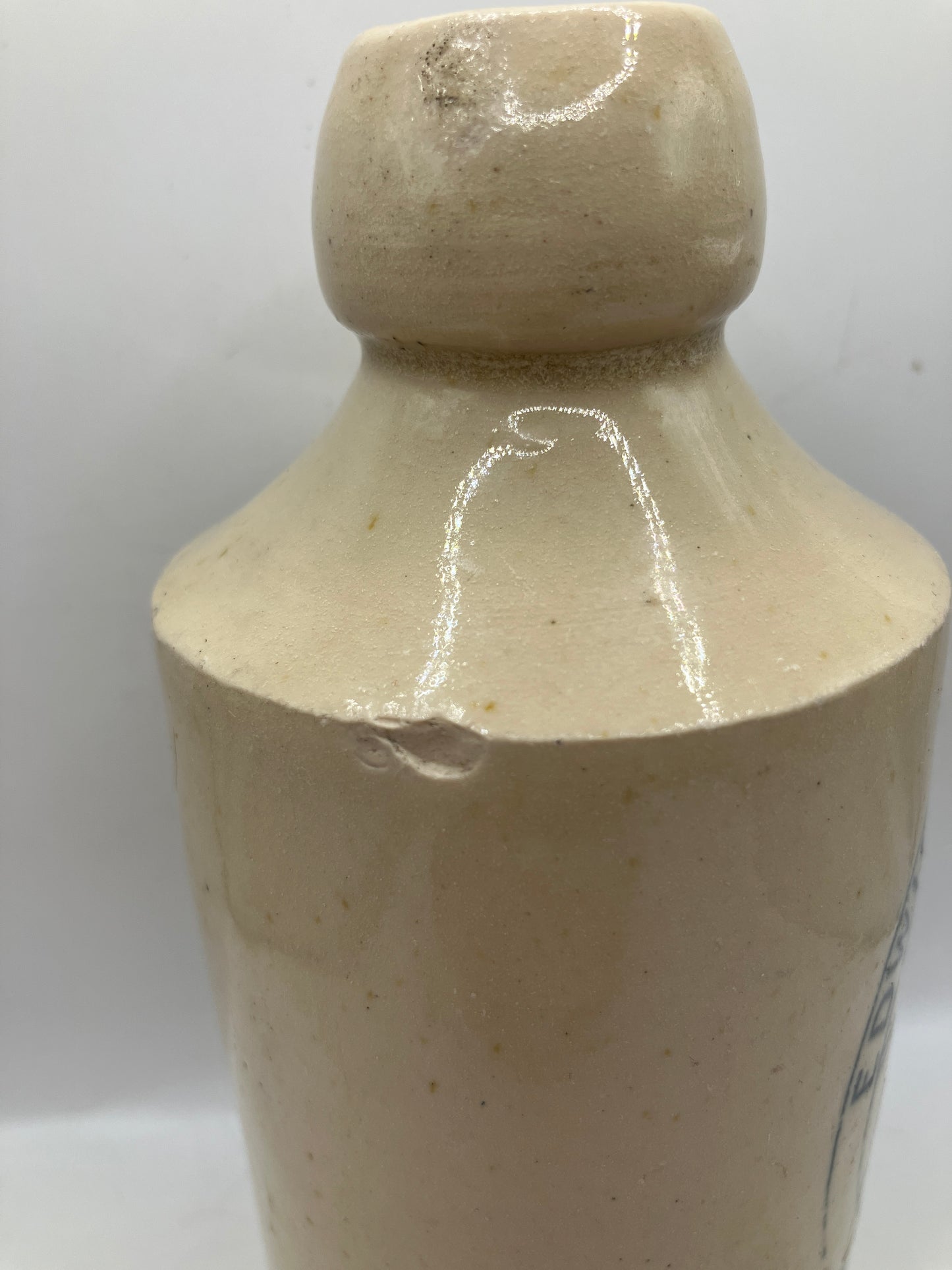 White stoneware ginger beer bottle, Canterbury