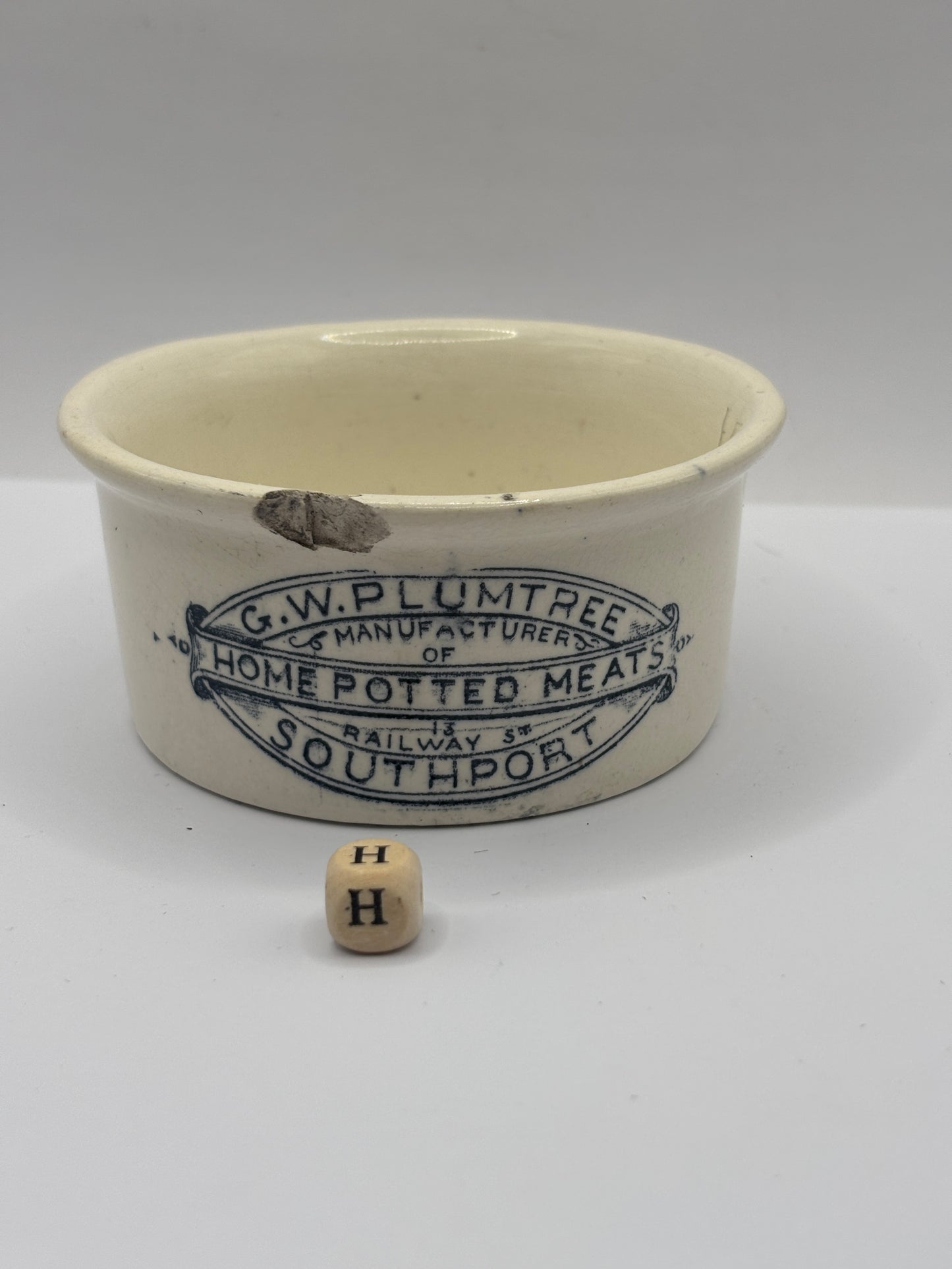 Old advertising meat paste pot, plumtrees (H) damaged