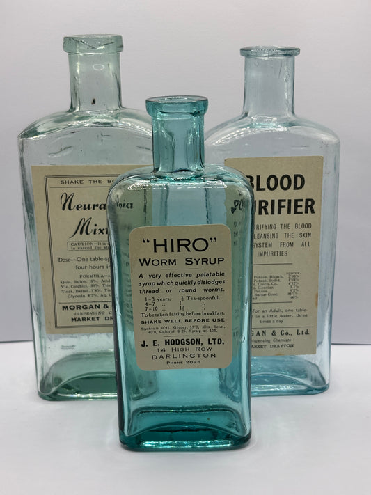 3 old chemist bottles with added chemist labels