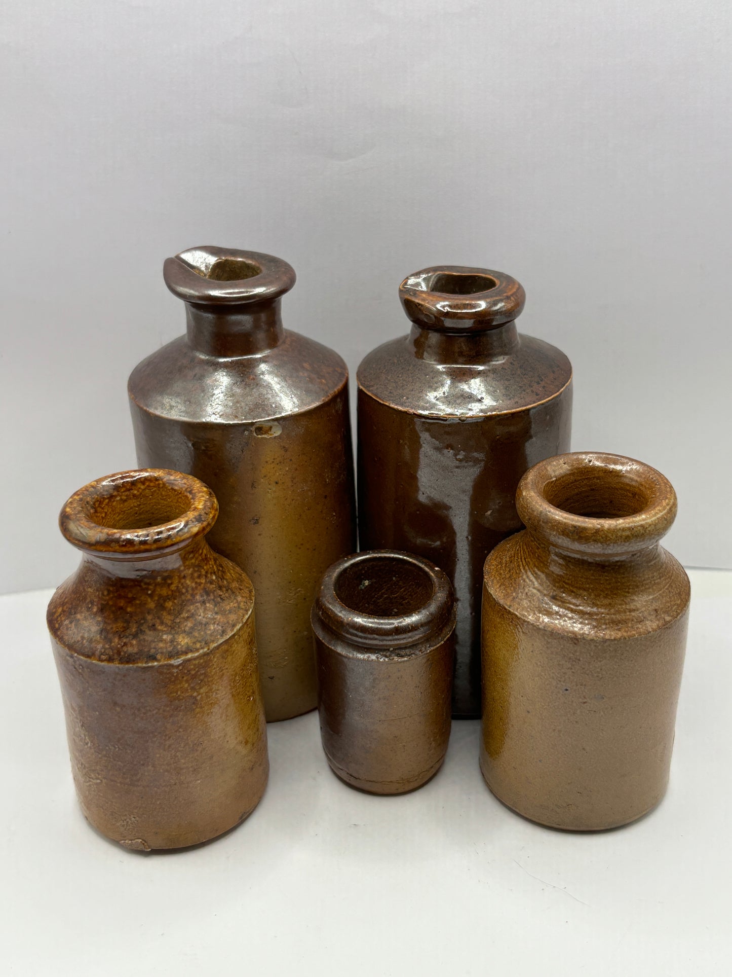 5 old brown stoneware pots