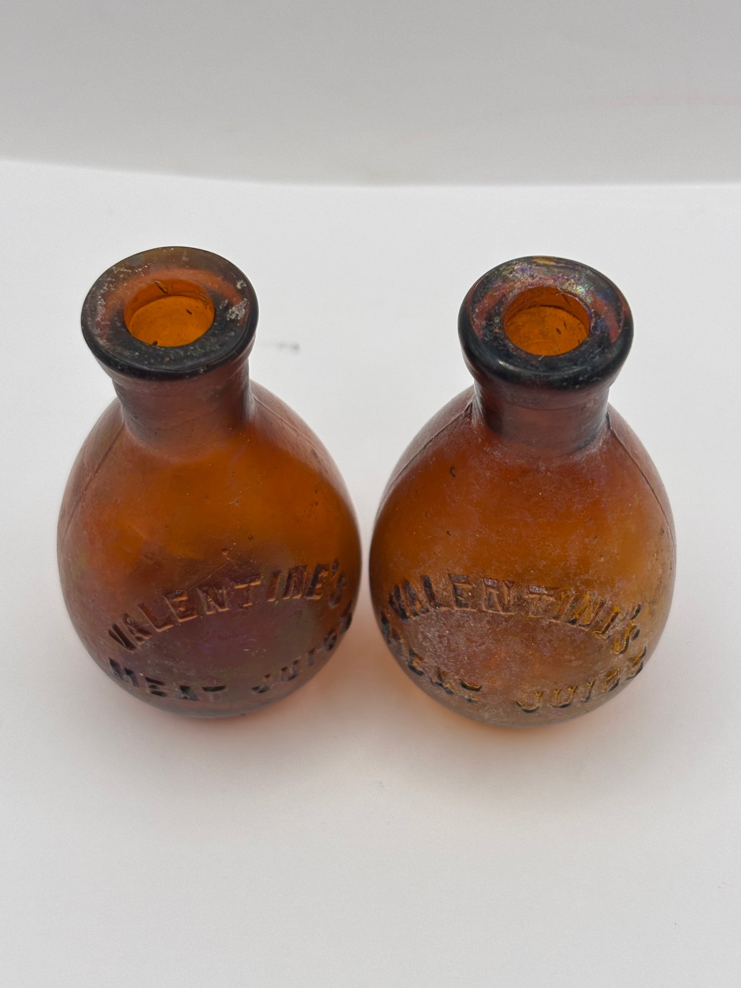 2 Old amber glass bottles, valentines meat juice