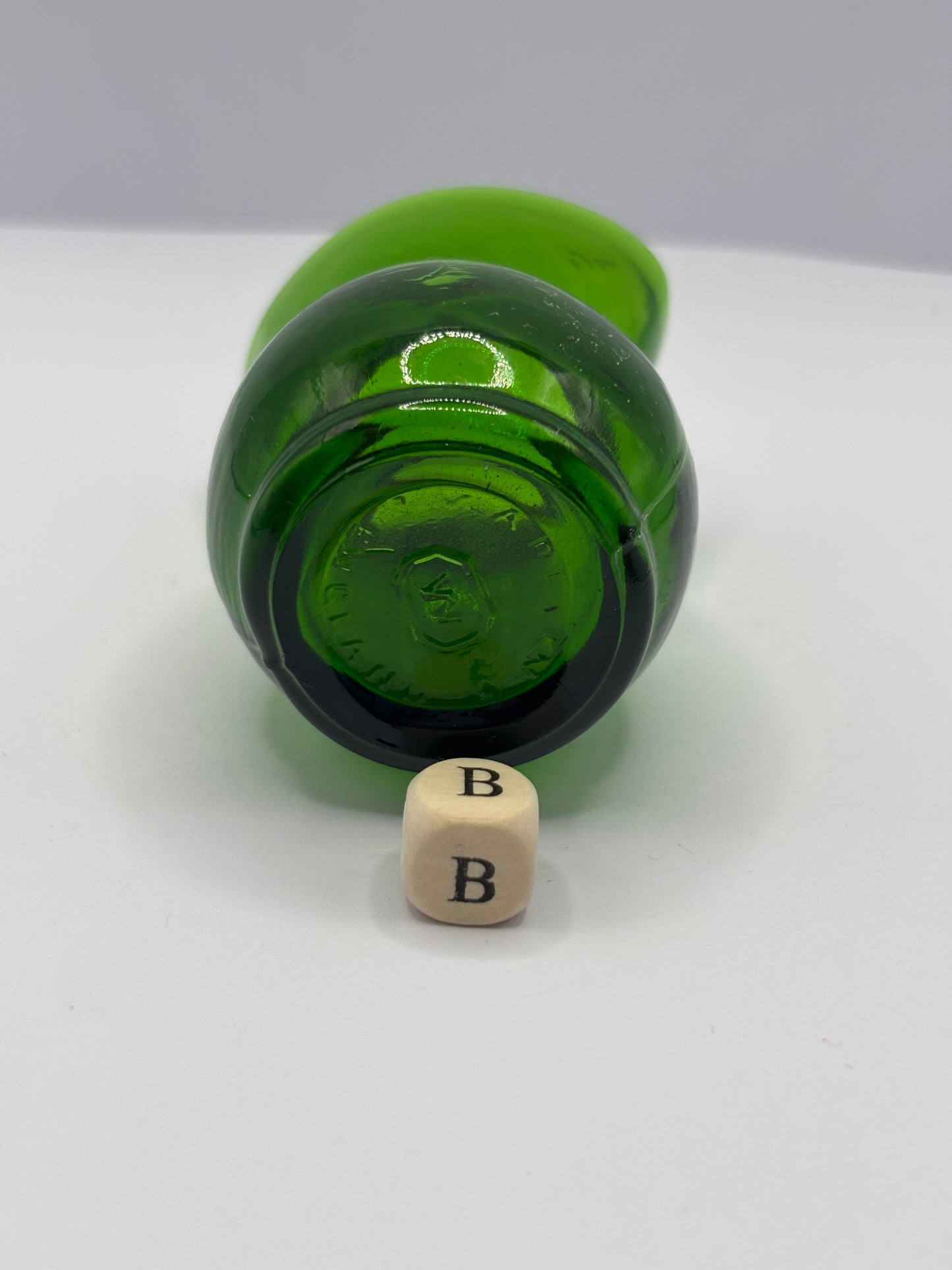 Old green glass eye bath (B)